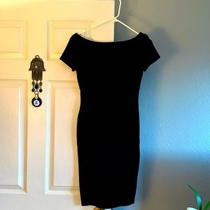 Lulus bodycon black backless cap sleeve dress. Size S